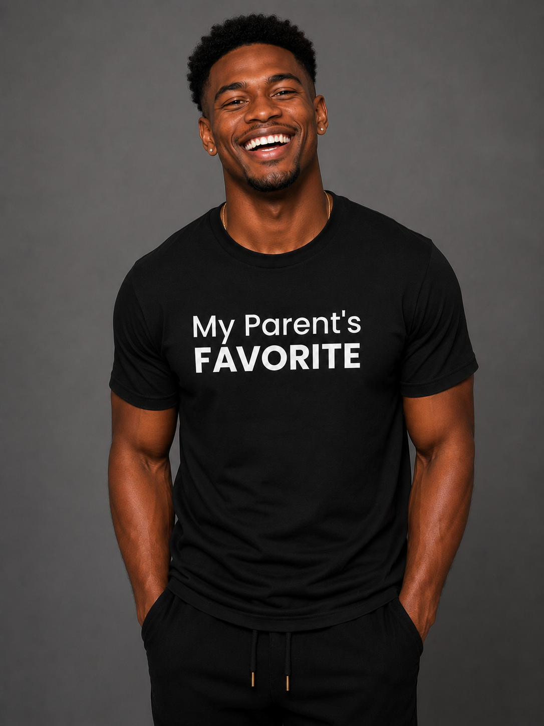 Man wearing a black t-shirt with 'My Parent's FAVORITE' text on a gray background